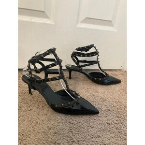 Valentino Garavani noir patent rockstud caged heels pumps